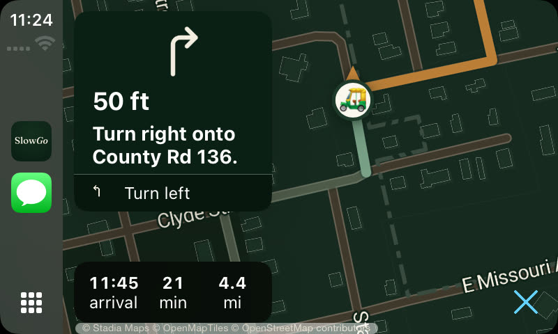 CarPlay Simulator capture from SlowGo's CarPlay testing in September 2026: 'In 50 ft, turn right onto County Rd 136', with arrival 11:45, 21 minutes and 4.4 miles left.
